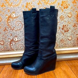 Wedge black leather boots